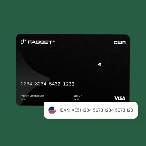 Black FASSET Visa card with card number, name Martin Jaferques, expiry 08/27, and a contactless payment symbol, displayed on green background with a white speech bubble showing an IBAN number and an American flag icon.