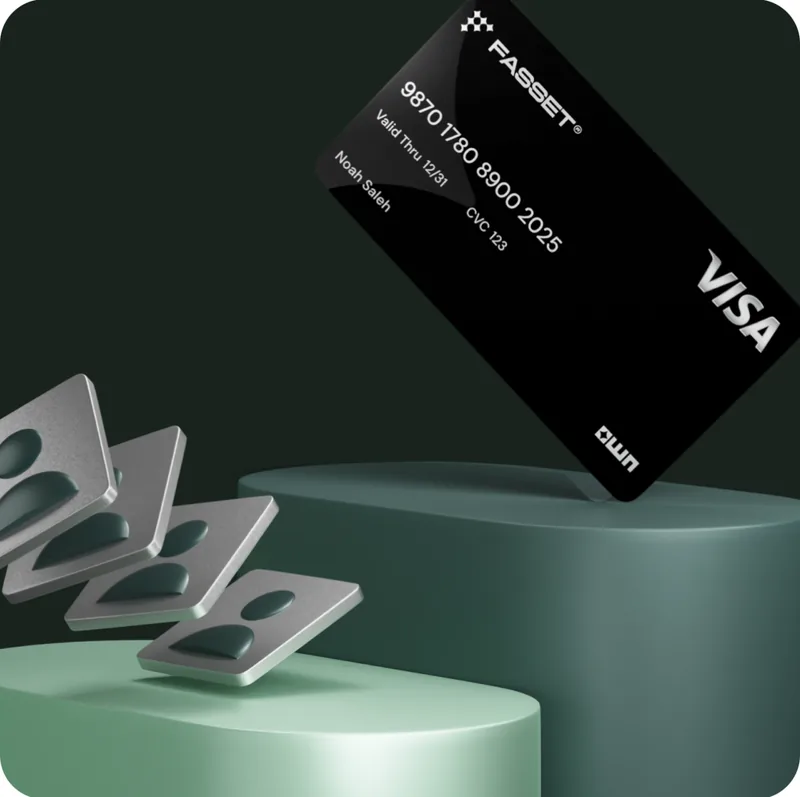 A black Fasset Visa card beside a row of identity cards fanned out on a green pedestal.