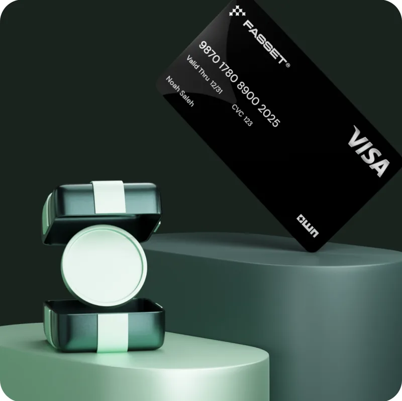 A black Fasset Visa card beside an open gift box holding a round mint-green token.