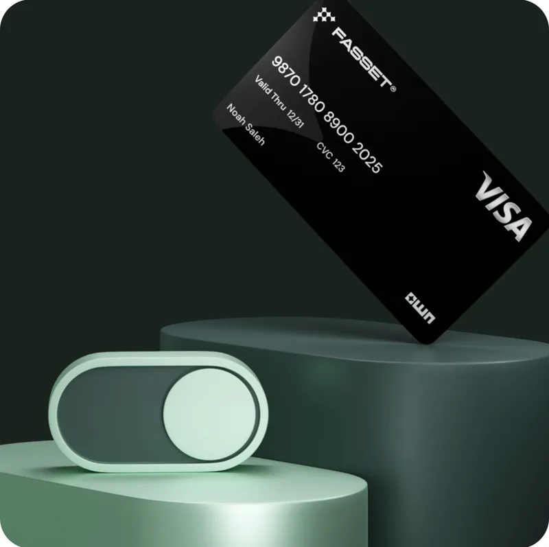 A black Fasset Visa card standing beside a large toggle switch on green pedestals.